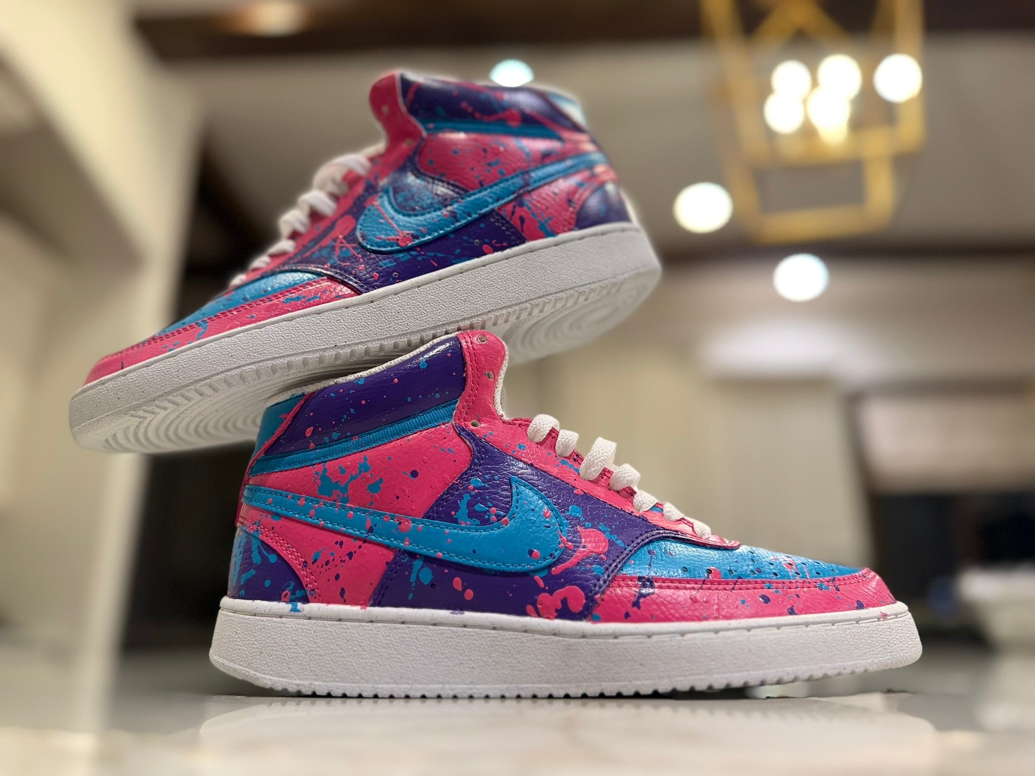 Hand-painted Nike mid-top sneakers in pink, purple, and sky-blue splatter — № 002, full pair